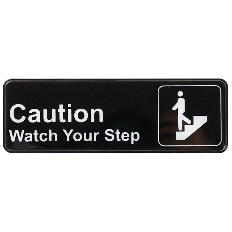 "Caution - Watch Your Step" Black & White Self-Adhesive Sign with Symbol - 9" L x 3" Hgt.