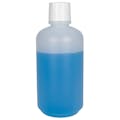 16 oz. Natural HDPE Boston Round Buttress Bottle with 38/430 White Ribbed Buttress Cap with F217 Liner