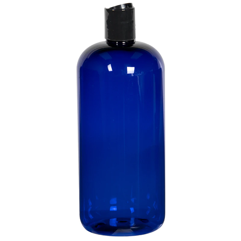16 oz. Cobalt Blue PET Traditional Boston Round Bottle with 24/410 Black Polypropylene Disc-Top Dispensing Cap