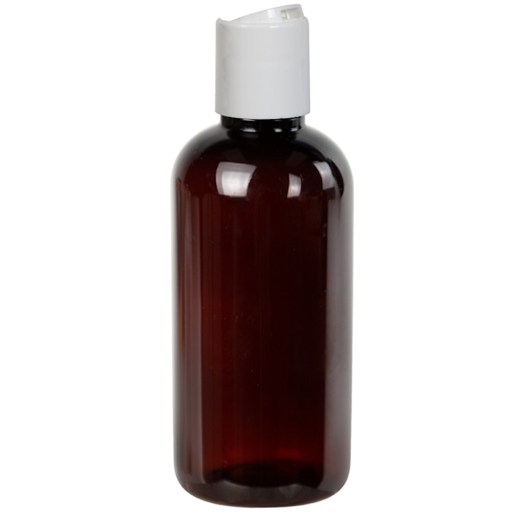 4 oz. Light Amber PET Traditional Boston Round Bottle with 24/410 White Polypropylene Dispensing Disc-Top Cap