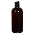 12 oz. Light Amber PET Traditional Boston Round Bottle with 24/410 Black Polypropylene Dispensing Disc-Top Cap
