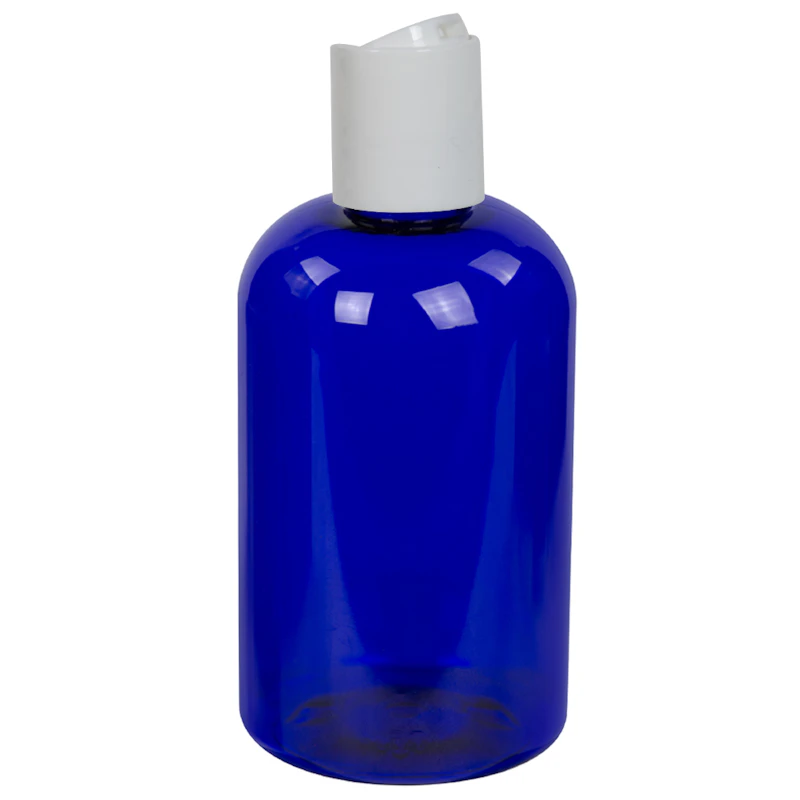 4 oz. Cobalt Blue PET Squat Boston Round Bottle with 20/410 White Polypropylene Disc-Top Dispensing Cap