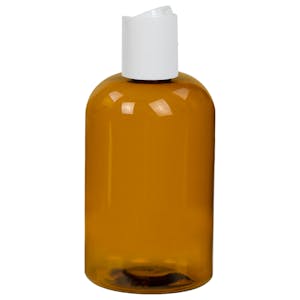 4 oz. Light Amber PET Squat Boston Round Bottle with 20/410 White Polypropylene Dispensing Disc-Top Cap