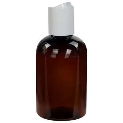 4 oz. Light Amber PET Squat Boston Round Bottle with 24/410 White Polypropylene Disc-Top Dispensing Cap