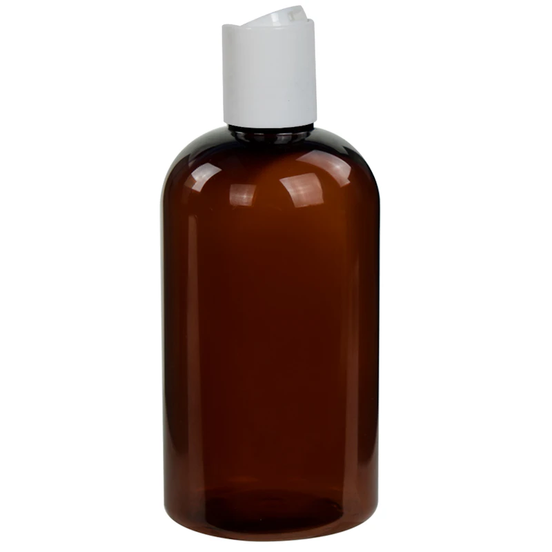 8 oz. Light Amber PET Squat Boston Round Bottle with 24/410 White Polypropylene Disc-Top Dispensing Cap