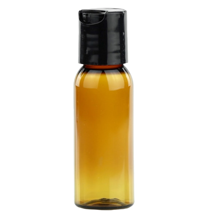 1 oz. Clarified Amber PET Cosmo Round Bottle with 20/410 Black Polypropylene Disc-Top Dispensing Cap