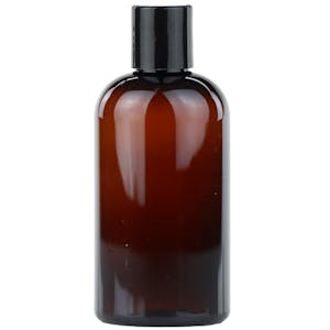 8 oz. Clarified Amber PET Cosmo Round Bottle with 24/410 Black Polypropylene Disc-Top Dispensing Cap