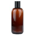 8 oz. Light Amber PET Cosmo Round Bottle with 24/410 Black Polypropylene Disc-Top Dispensing Cap