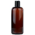 16 oz. Light Amber PET Cosmo Round Bottle with 24/410 Black Polypropylene Disc-Top Dispensing Cap