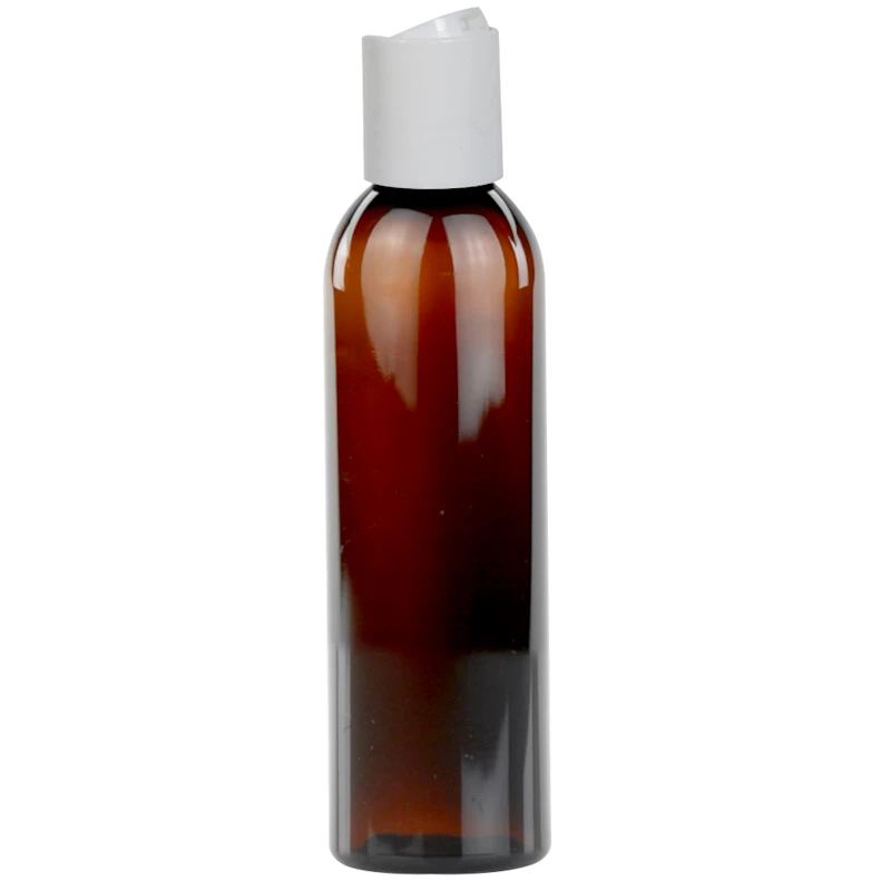 6 oz. Light Amber PET Cosmo Round Bottle with 24/410 White Polypropylene Disc-Top Dispensing Cap