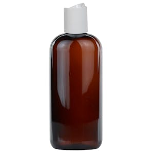 16 oz. Light Amber PET Cosmo Round Bottle with 24/410 White Polypropylene Disc-Top Dispensing Cap