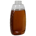 24 oz. (Honey Weight) Clear PET Honeycomb-Embossed Inverted Oval Bottle with 38/400 Neck (Cap Sold Separately)