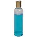 4 oz. Clear PET High Clarity Cosmo Round Bottle with 20/410 Gold & White ABS/Polypropylene Disc-Top Dispensing Cap