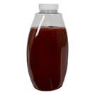 18 oz. Clear PET Inverted Oval Sauce Bottle with 38/400 White Ribbed Unlined Cap