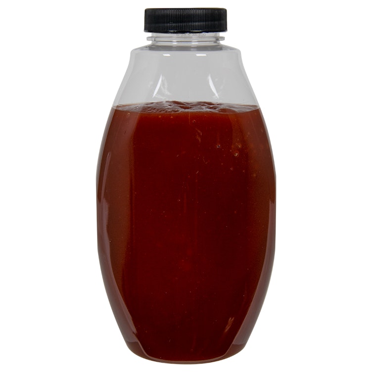 18 oz. Clear PET Inverted Oval Sauce Bottle with 38/400 Black Ribbed Cap with F217 Liner