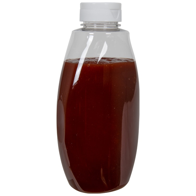 18 oz. Clear PET Inverted Oval Sauce Bottle with 38/400 White Ribbed Snap-Top Dispensing Cap