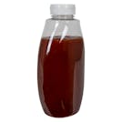 18 oz. Clear PET Inverted Oval Sauce Bottle with 38/400 White Ribbed Snap-Top Dispensing Cap with Pressure-Sensitive Liner
