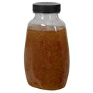 9 oz. Clear PET Clark Oblong Bottle with 38/400 Black Ribbed Cap with Foil Induction Seal