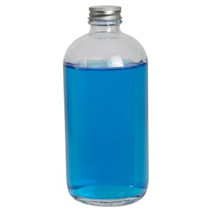 16 oz. Clear Glass Boston Round Bottle with 28/400 Brushed Silver Aluminum Cap with Foam Liner