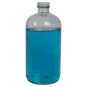 32 oz. Clear Glass Boston Round Bottle with 33/400 White/Gold Tin Cap with Pulp/PE Liner