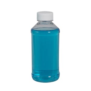 1 oz. Clear PET Modern Round Bottle with 20/410 White Ribbed Cap with F217 Liner