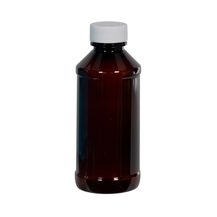 1 oz. Amber PET Modern Round Bottle with 20/410 White Ribbed Cap with F217 Liner