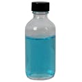 2 oz. Clear Glass Boston Round Bottle with 20/400 Black Phenolic Cap with Pulp & Vinyl Liner