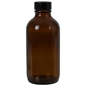 4 oz. Amber Glass Boston Round Bottle with 22/400 Black Phenolic Cap with Pulp & Vinyl Liner