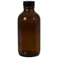 4 oz. Amber Glass Boston Round Bottle with 22/400 Black Phenolic Cap with Pulp & Vinyl Liner