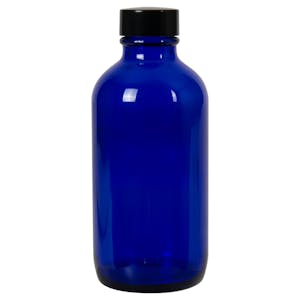 4 oz. Cobalt Blue Glass Boston Round Bottle with 22/400 Black Phenolic Cap with Pulp & Vinyl Liner