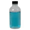 8 oz. Clear Glass Boston Round Bottle with 24/400 Black Phenolic Cap with Pulp & Vinyl Liner