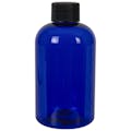 4 oz. Clarified Amber PET Squat Boston Round Bottle with 20/410 Black Ribbed Cap with F217 Liner