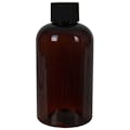 6 oz. Light Amber PET Squat Boston Round Bottle with 24/410 Black Ribbed Cap with F217 Liner