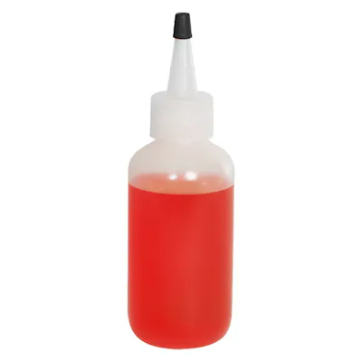 4 oz. Natural LDPE Boston Round Bottle with 24/410 Natural Yorker Dispensing Cap with Regular Black Tip