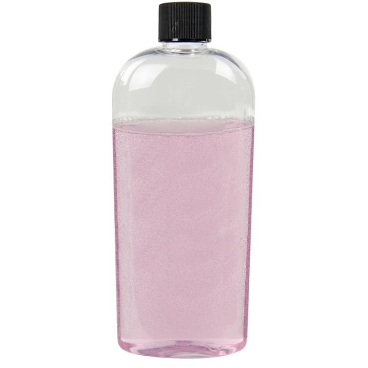 12 oz. Clear PET Cosmo High Clarity Oval Bottle with 24/410 Black Ribbed Cap with F217 Liner