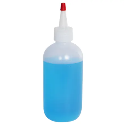 8 oz. Natural LDPE Boston Round Bottle with 24/410 Natural Yorker Dispensing Cap with Regular Red Tip