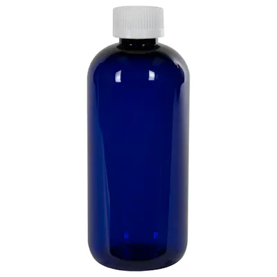 12 oz. Cobalt Blue PET Traditional Boston Round Bottle with 24/400 White Ribbed CRC Cap with F217 Liner