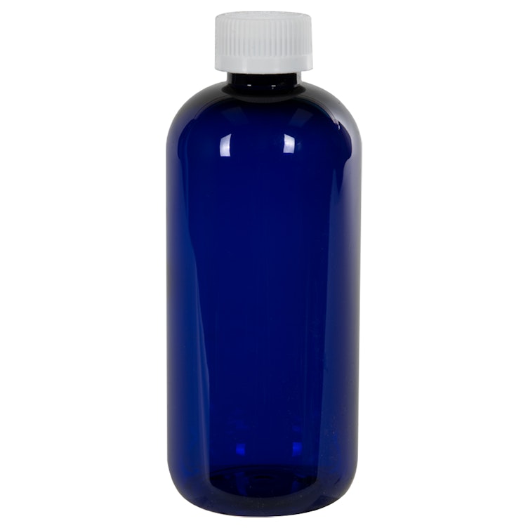 12 oz. Cobalt Blue PET Traditional Boston Round Bottle with 24/410 White Ribbed CRC Cap with F217 Liner