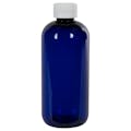 12 oz. Cobalt Blue PET Traditional Boston Round Bottle with 24/410 White Ribbed CRC Cap with F217 Liner