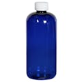16 oz. Cobalt Blue PET Traditional Boston Round Bottle with 28/410 White Ribbed CRC Cap with F217 Liner