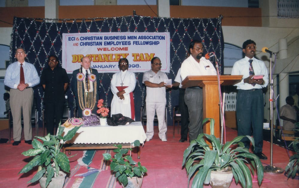 Stanley being recognized at a Christian business association in India