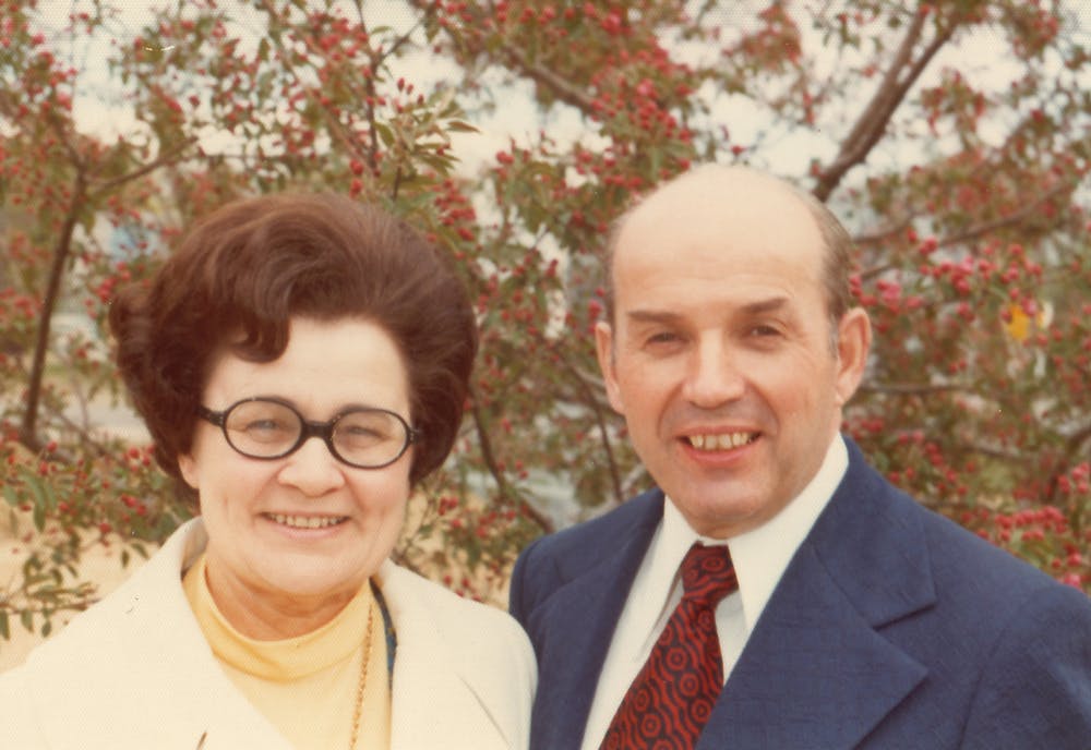 Stanley and his wife, Juanita, in front of a tree