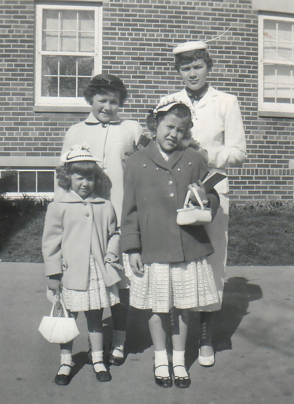 Stanley's four daughters dressed for Church