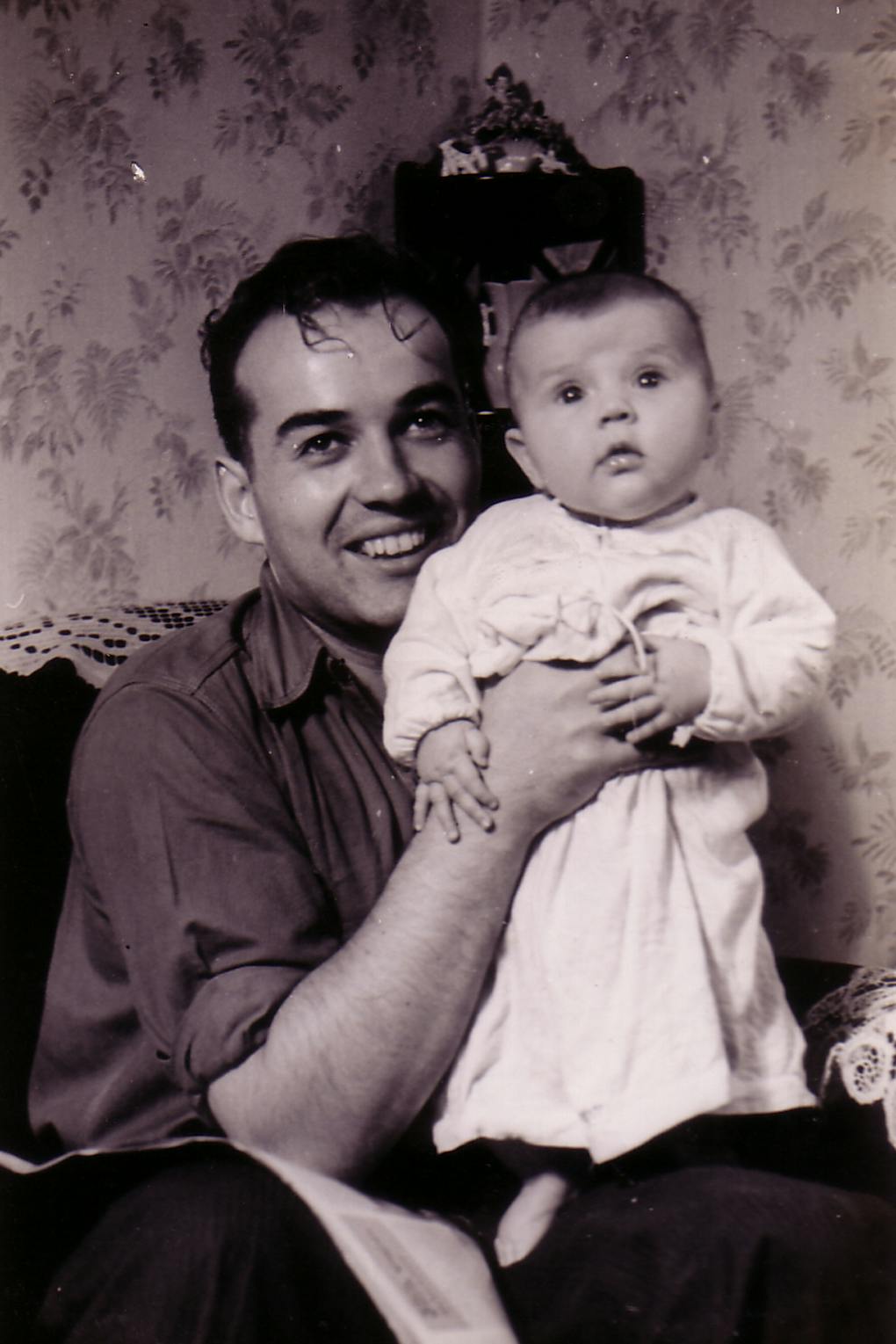 Stanley holding his young daughter Rachel