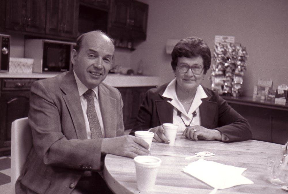 Stanley and his wife, Juanita, seated in a cafeteria