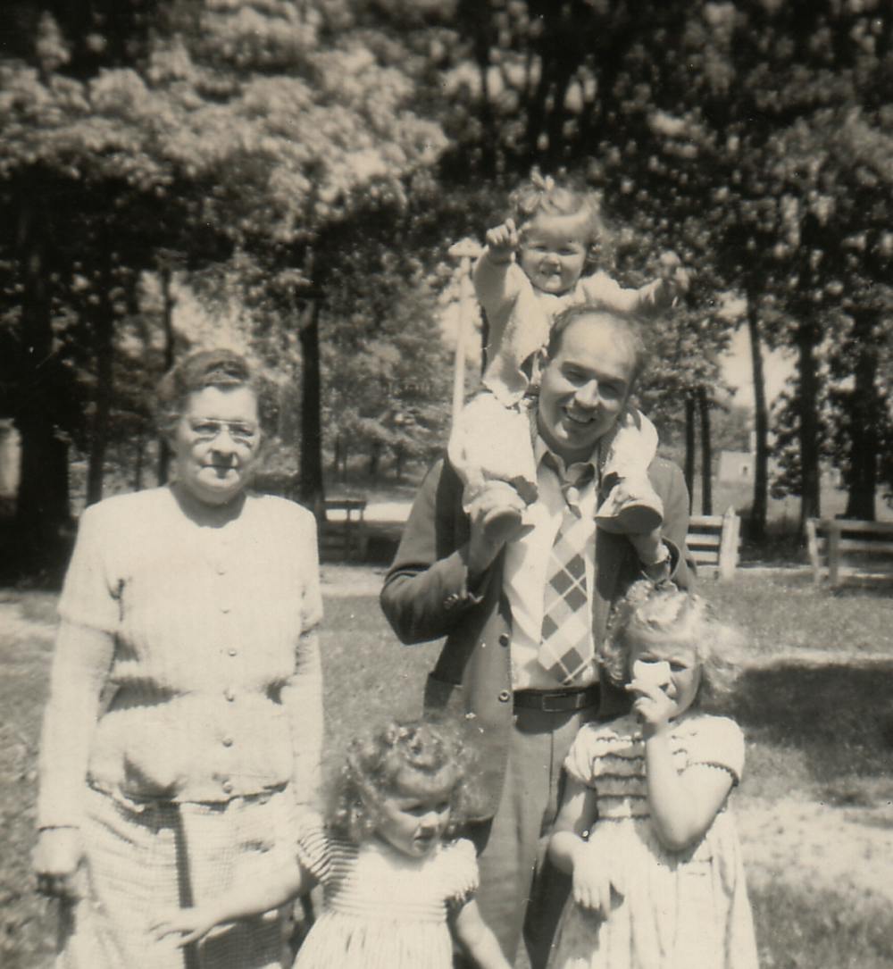 Stanley at a park with his wife and three daughters. His daughter Prudy is on his shoulders